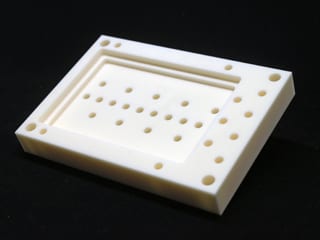 A ceramic part with different heights and holes diameters